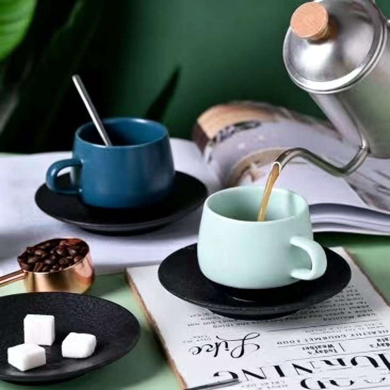 Black and white ring-handle cups